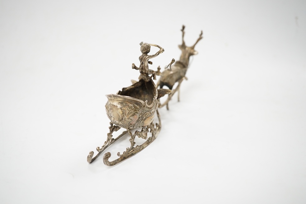 A modern continental silver sleigh with putto and reindeer, import marks for London, 1974, 16cm. Condition - poor